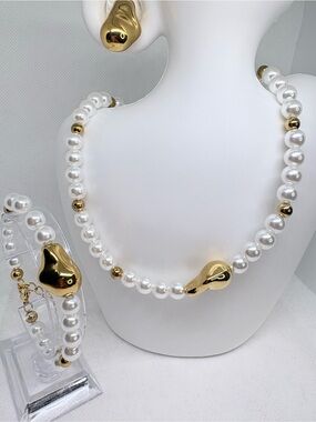 Elegant White Pearl and Gold Accent Necklace by